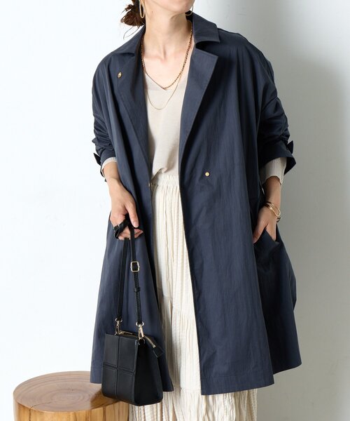 Jena espace merveilleux（ジェナ　エスパスメルヴェイユ）の「バックラッフルテントコート（ステンカラーコート・レディース・ネイビー/ベージュ・FREE）」の7枚目の写真