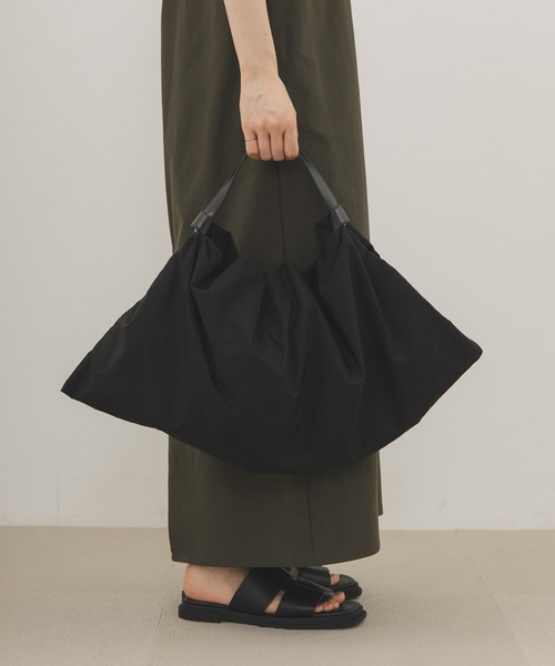 KBF(ケイビーエフ)の「ノットデザインワンハンドルBAG(ハンドバッグ・レディース・イエロー系その他/ブラック・ONE)」の1枚目の写真