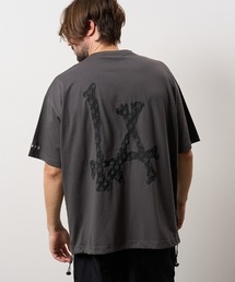 STUD MUFFIN（スタッドマフィン）の「mt10760- 7ozコットンファインジャージー BONE LAプリントドローコードSSシャツ(714-02940)（Tシャツ/カットソー）」