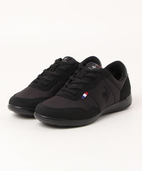 le coq sportif(ルコックスポルティフ)の「《le coq sportif》ラ セギュール III ワイド(スニーカー・レディース・ベージュ系その他/ブラック/ホワイト×ネイビー・25.0cm/22.5cm/23.0cm/24.0cm/24.5cm/23.5cm)」の2枚目の写真