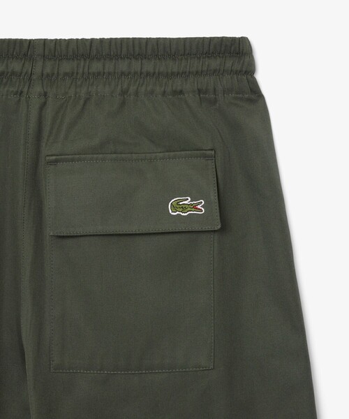 LACOSTE（ラコステ）の「アシンメトリー ワイドストレート カーゴポケットパンツ（その他パンツ・レディース・ダークグリーン・40/38/36/34）」の7枚目の写真