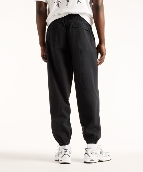 NEW BALANCE(ニューバランス)の「NB GREY ジョガーパンツ(スウェットパンツ・メンズ・グレイッシュブルー/ブラック・MEDIUM/SMALL/XX-LARGE/X-LARGE/LARGE)」の3枚目の写真