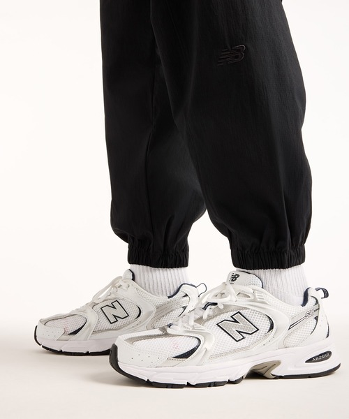 NEW BALANCE(ニューバランス)の「NB GREY ジョガーパンツ(スウェットパンツ・メンズ・グレイッシュブルー/ブラック・MEDIUM/SMALL/XX-LARGE/X-LARGE/LARGE)」の4枚目の写真