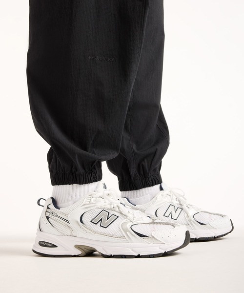 NEW BALANCE(ニューバランス)の「NB GREY ジョガーパンツ(スウェットパンツ・メンズ・グレイッシュブルー/ブラック・MEDIUM/SMALL/XX-LARGE/X-LARGE/LARGE)」の7枚目の写真