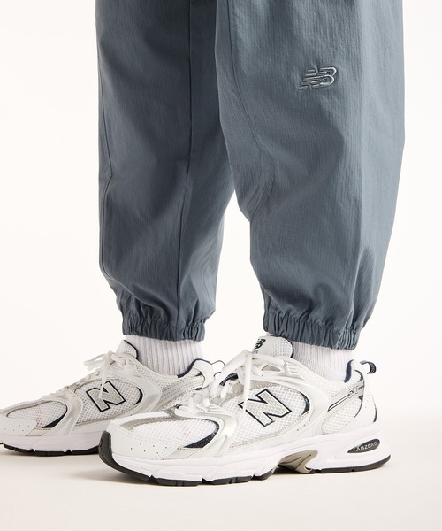 NEW BALANCE(ニューバランス)の「NB GREY ジョガーパンツ(スウェットパンツ・メンズ・グレイッシュブルー/ブラック・MEDIUM/SMALL/XX-LARGE/X-LARGE/LARGE)」の10枚目の写真