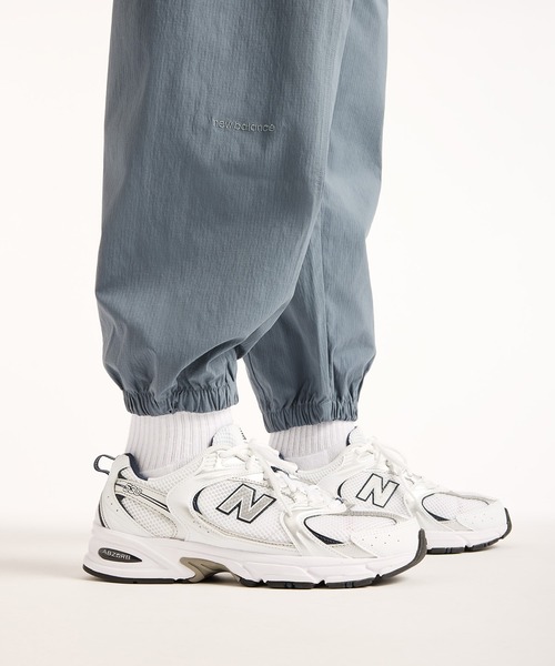 NEW BALANCE(ニューバランス)の「NB GREY ジョガーパンツ(スウェットパンツ・メンズ・グレイッシュブルー/ブラック・MEDIUM/SMALL/XX-LARGE/X-LARGE/LARGE)」の12枚目の写真