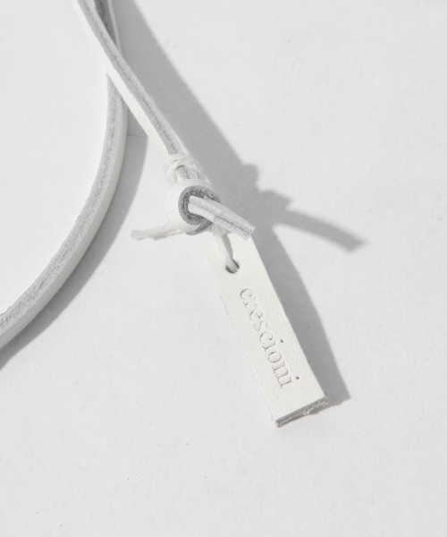 Ray BEAMS(レイビームス)の「crescioni / Flor Neck Lace(ネックレス・レディース・ホワイト/ブラック・ONE SIZE)」の4枚目の写真