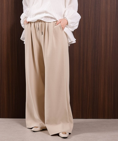 en CAnAF（エンカナフ）の「【心地よい履き心地とキレイ見えが叶う】スムースタッチパンツ（その他パンツ・レディース・ブラック/ベージュ・フリー）」の2枚目の写真