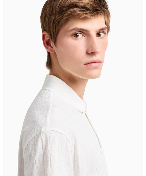 ARMANI EXCHANGE（アルマーニエクスチェンジ）の「【A|X アルマーニ エクスチェンジ】オールオーバージャカードロゴ 半袖ポロシャツ/REGULAR+（ポロシャツ・メンズ・ホワイト・MEDIUM/SMALL/X-LARGE/X-SMALL/LARGE）」の5枚目の写真