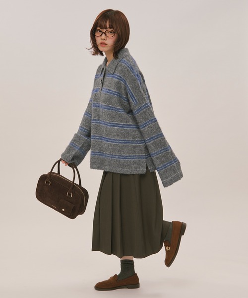loin nuit（ロワンニュイ）の「striped pattern button knit
