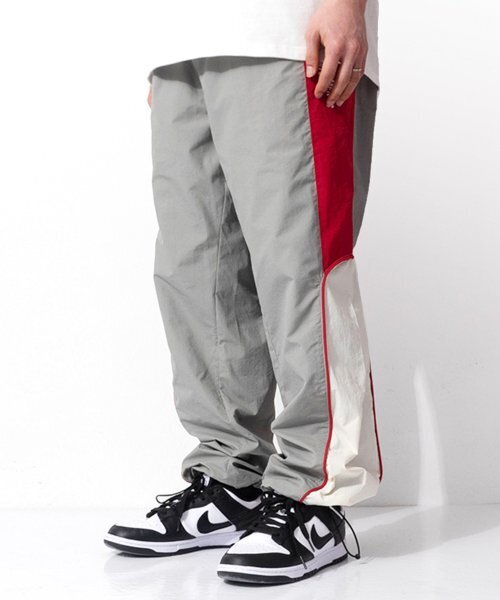 QT8 GARMENTS(キューティーエイトガーメント)の「GB Old Track Pant (Grey/Red)(スウェットパンツ・レディース・その他・LARGE/MEDIUM/X-LARGE)」の1枚目の写真