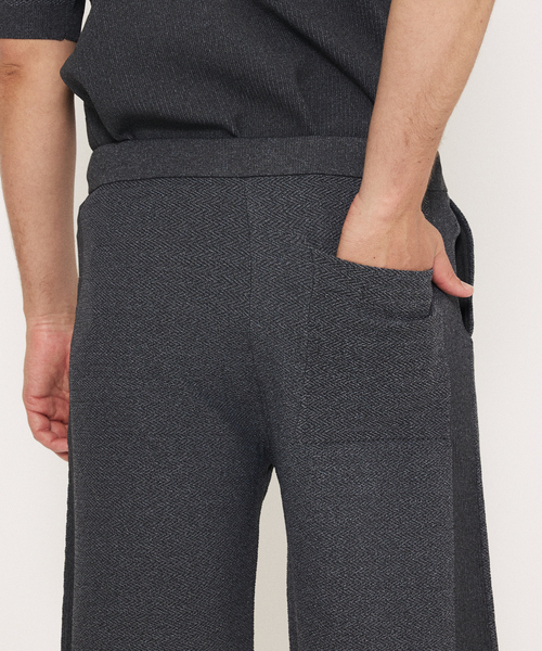 DESIGNWORKS(デザインワークス)の「【セットアップ対応】ヘリンボーン サマーニット ショートパンツ(その他パンツ・メンズ・ライトグレー/グレイッシュベージュ/チャコールグレー・46/48)」の9枚目の写真