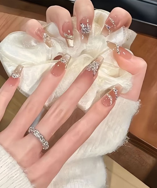 Lace Ladies（レースレディース）の「ビジュー付き バタフライ アート ラメ ネイルチップ（ネイルシール/ネイルチップ・レディース・ベージュ・M/S/XS）」の3枚目の写真