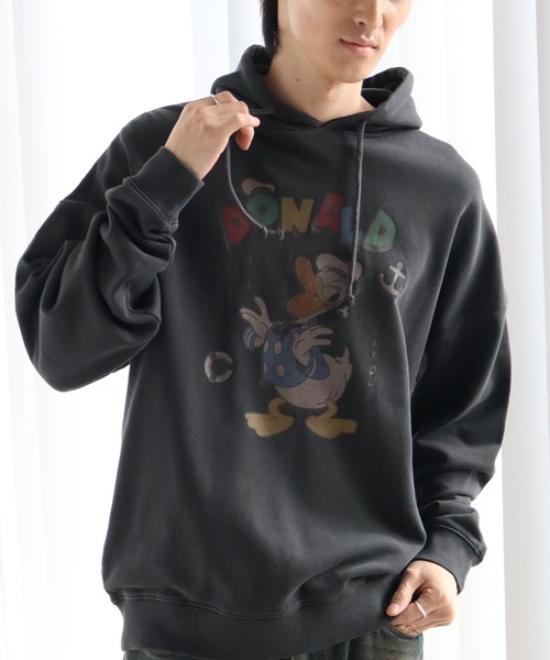 Disney(ディズニー)の「【Disneycollection/ディズニーコレクション】ヴィンテージピグメント加工アソートデザイン 裏毛 プルオーバーパーカー(パーカー・メンズ・ブラック系2/ブラック系3/ブラック系1/ブラック系その他2/ブラック系9/ブラック系8/ブラック系6/ブラック系/ブラック系その他/ブラック系4/ブラック系その他3/ブラック系5/ブラック系7・L/M/XL)」の7枚目の写真