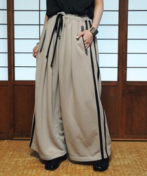 U.S. POLO ASSN.（ユーエスポロアッスン）の「U.S. POLO ASSN. / ユーエスポロアッスン 別注 コラボ オーバーサイズ 総ゴム ライン配色 トラックパンツ（その他パンツ）」