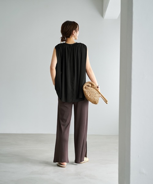 dinos - ディノス　フェイクレザー ボタンスリットパンツ selle glant（セレグランテ）の「SIDE DOT BOTTON SLIT PANTS