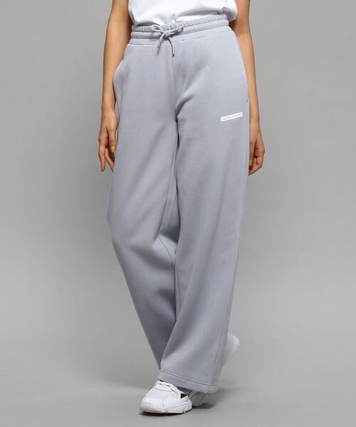 Calvin Klein(カルバン・クライン)の「AS マイクロ フロック ジョガーパンツ(スウェットパンツ・レディース・ブラック/グレー系その他・S/M/XS)」の1枚目の写真