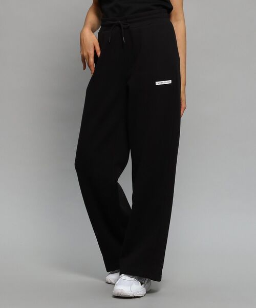 Calvin Klein(カルバン・クライン)の「AS マイクロ フロック ジョガーパンツ(スウェットパンツ・レディース・ブラック/グレー系その他・S/M/XS)」の2枚目の写真