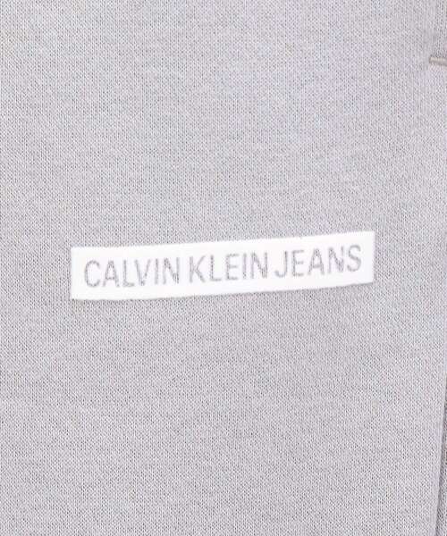 Calvin Klein(カルバン・クライン)の「AS マイクロ フロック ジョガーパンツ(スウェットパンツ・レディース・ブラック/グレー系その他・S/M/XS)」の10枚目の写真