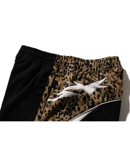 WILD LEOPARD PATTERN OVERSIZED FIT TRACK PANTS（その他パンツ）｜A