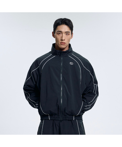 TOLANCE(トランス)の「ストリームカーブドパイピングジャケット - ブラック(ナイロンジャケット・メンズ・ブラック・MEDIUM/LARGE/X-LARGE/XX-LARGE)」の1枚目の写真