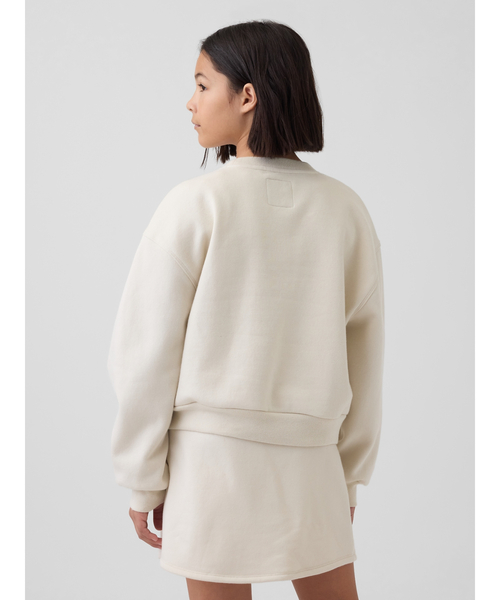 GAP（ギャップ）の「GapKids × ディズニー オーバーサイズ ウェッジ GAPロゴ スウェットシャツ（スウェット・キッズ・ベージュ/ピンク・120cm/130cm/140cm/150cm/160cm）」の9枚目の写真