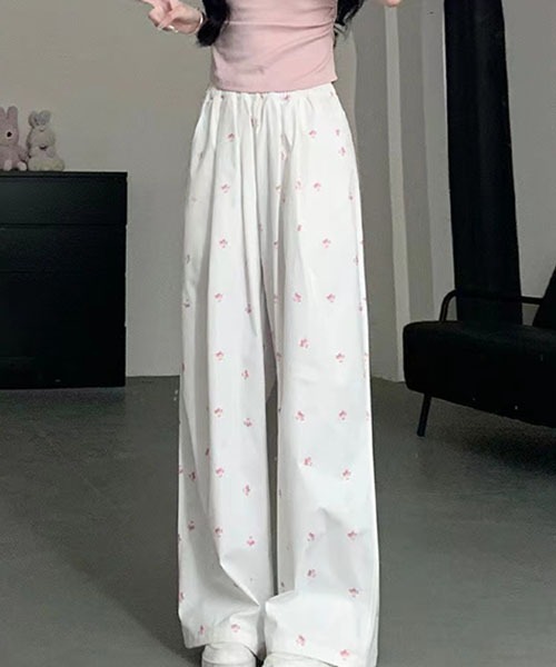 gossip!ロサンゼルス(ゴシップロサンゼルス)の「リボンプリントパンツ(スラックス・レディース・ホワイト・S/M/L)」の1枚目の写真