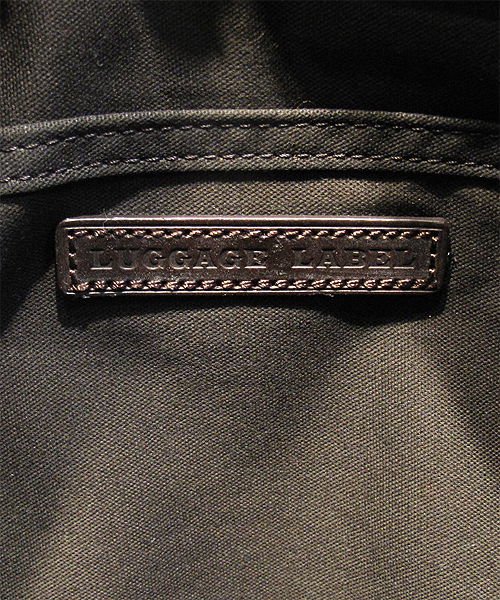 PORTER（ポーター）の「LUGGAGE LABEL PROOF SHOULDER BAG <B印 YOSHIDA SELECT>（ショルダーバッグ・メンズ・ブラウン・ONE SIZE）」の11枚目の写真