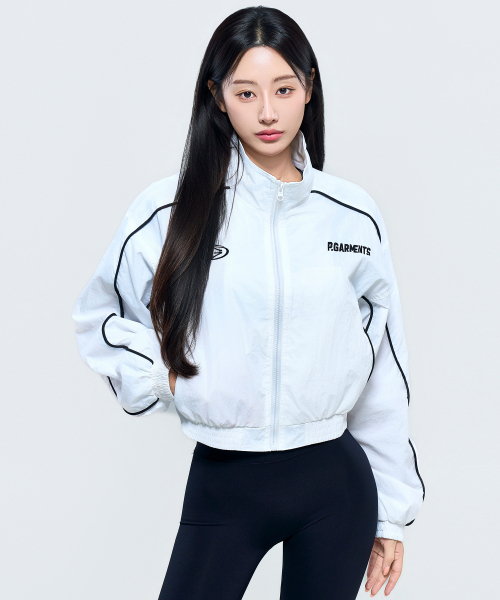 PHYSICAL GARMENTS（フィジカルガーメンツ）の「P5035 ウィメンズ パイピング ウインドブレーカー クロップドジャケット [ホワイト]（ナイロンジャケット・レディース・ホワイト・FREE）」の4枚目の写真