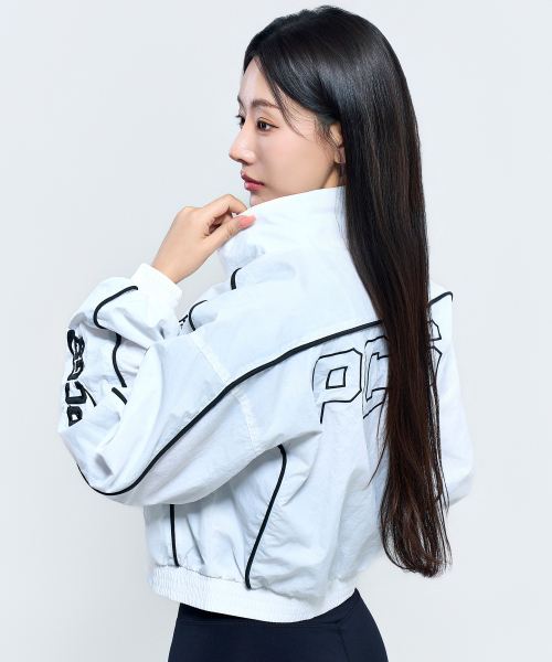 PHYSICAL GARMENTS（フィジカルガーメンツ）の「P5035 ウィメンズ パイピング ウインドブレーカー クロップドジャケット [ホワイト]（ナイロンジャケット・レディース・ホワイト・FREE）」の5枚目の写真