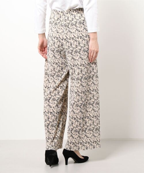 CHARM BERRY TIC(チャームベリーチック)の「花柄クリスタルプリーツパンツ(その他パンツ・レディース・ホワイト×ブラック/ブラック×ホワイト・M)」の7枚目の写真