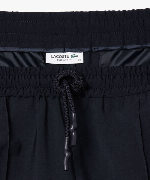 LACOSTE(ラコステ)の「センタークリースステッチ ウールブレンド テーパードトラックパンツ(その他パンツ・レディース・ダークネイビー・38/36/34)」の3枚目の写真