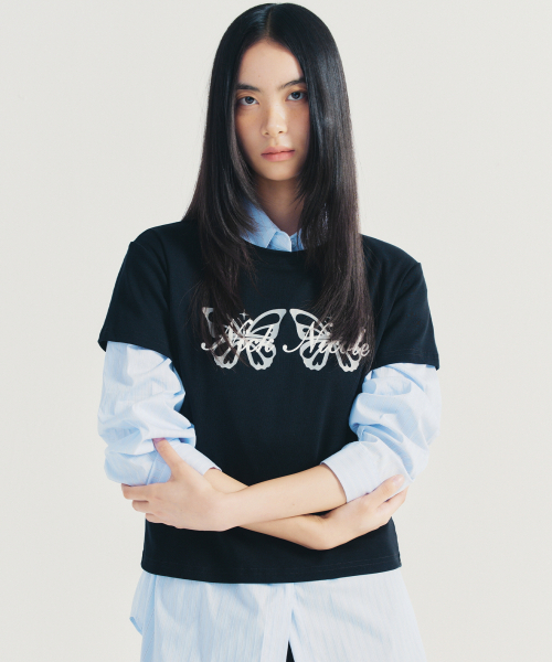 NICK&NICOLE(ニックアンドニコール)の「BUTTERFLY TWINS GRAPHIC TOP_BLACK(Tシャツ/カットソー・レディース・ブラック・FREE)」の2枚目の写真