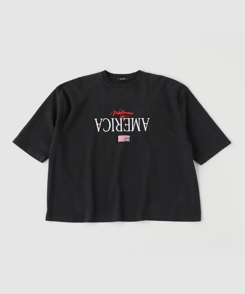 WILLY CHAVARRIA(ウィリーチャバリア)の「WILLY CHAVARRIA / ウィリー チャバリア WELCOME TO AMERICA-BUFFA(Tシャツ/カットソー・メンズ・ブラック・SMALL)」の1枚目の写真