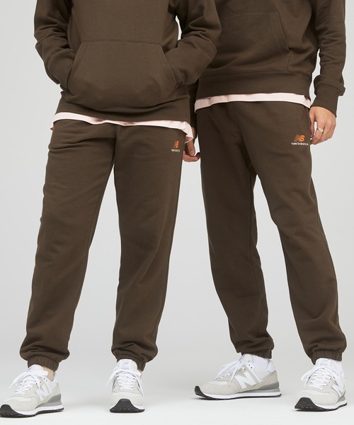 NEW BALANCE(ニューバランス)の「NB Essentials uni-ssentials スウェットパンツ(スウェットパンツ・メンズ・ピンクベージュ/カーキ/ネイビー/ブラック/ホワイト・01/02/03/04/05/00)」の1枚目の写真