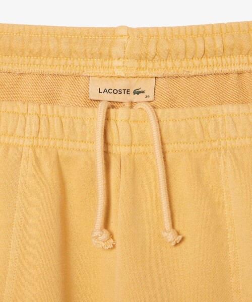 LACOSTE（ラコステ）の「コンパクトスウェットショートパンツ（スウェットパンツ・レディース・イエロー/ピンク・36/38）」の4枚目の写真