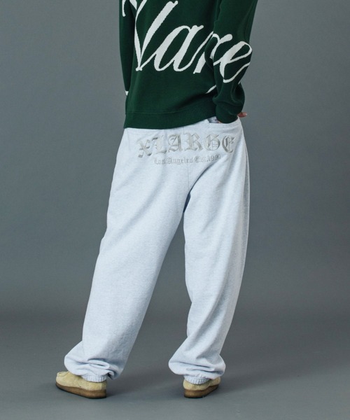XLARGE(エクストララージ)の「OLD ENGLISH SWEAT PANTS(スウェットパンツ・メンズ・ブラック/オリーブ/アッシュ/ネイビー・S/M/L/XL)」の3枚目の写真