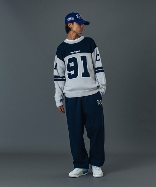 XLARGE(エクストララージ)の「OLD ENGLISH SWEAT PANTS(スウェットパンツ・メンズ・ブラック/オリーブ/アッシュ/ネイビー・S/M/L/XL)」の14枚目の写真