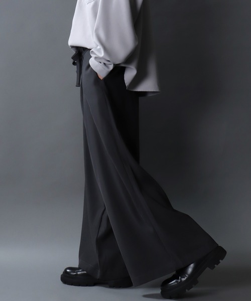 SITRY（シトリー）の「Gabardine Drape Wide Skirt Pants/ギャバジン ドレープ スカートパンツ ワイドパンツ スラックス 袴パンツ レディース メンズ（スラックス・メンズ・チャコール/アイボリー/ブラック・L/M）」の16枚目の写真