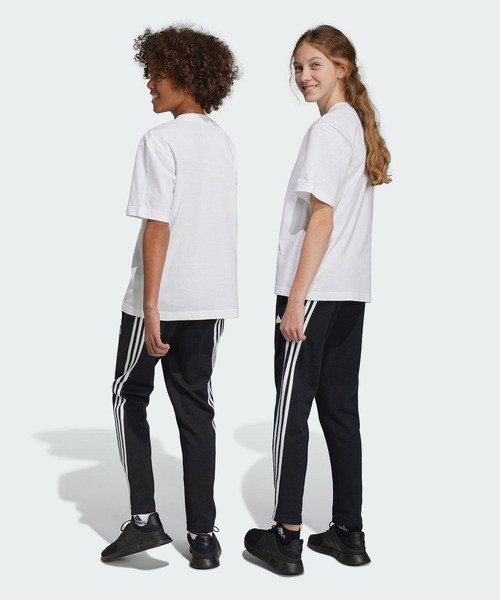 adidas（アディダス）の「フューチャーアイコン スリーストライプス アンクルパンツ / アディダス adidas（その他パンツ・キッズ・パープル/ブラック・150/160/130/140）」の3枚目の写真
