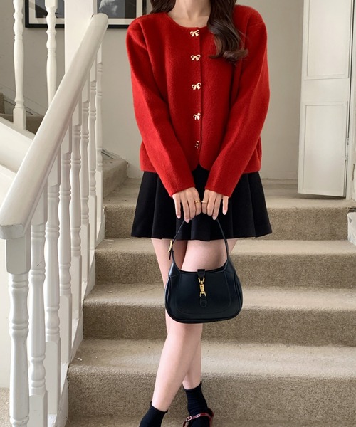 Girly Doll（ガーリードール）の「リボン釦ニットカーディガン