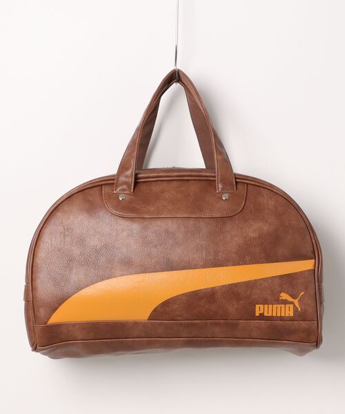 PUMA x DUA LIPA グリップバッグ(プーマ　ボストンバッグ) PUMA（プーマ）の「PUMA プーマ ウィメンズ PUMA x DUA LIPA