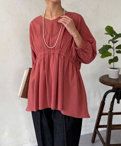 Chez toi（シェトワ）の「ギャザーペプラムチュニック（シャツ/ブラウス・レディース・オレンジ/ホワイト/ブラック・FREE）」の3枚目の写真