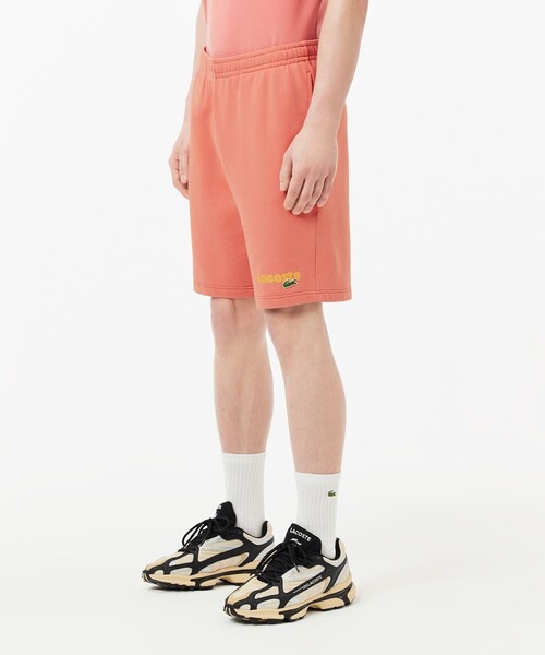 LACOSTE(ラコステ)の「オーガニックコットン 裏パイル ウォッシュドシンプルスウェットショーツ(スウェットパンツ・メンズ・イエロー/ローズ・3/4/2/5)」の2枚目の写真