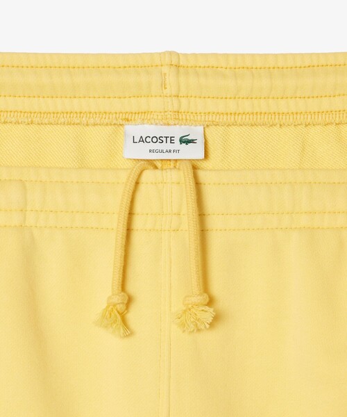 LACOSTE(ラコステ)の「オーガニックコットン 裏パイル ウォッシュドシンプルスウェットショーツ(スウェットパンツ・メンズ・イエロー/ローズ・3/4/2/5)」の8枚目の写真