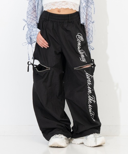 ANAP GiRL(アナップガール)の「サイドリボン ジップ シャカ 2WAYパンツ(その他パンツ・キッズ・レッド/サックスブルー/ブラック・M/XS/S)」の1枚目の写真