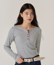 TINA：JOJUN（ティーナジョジュン）の「ハートボタン ヘンリーネック ロンT TINA：JOJUN（Tシャツ/カットソー）」