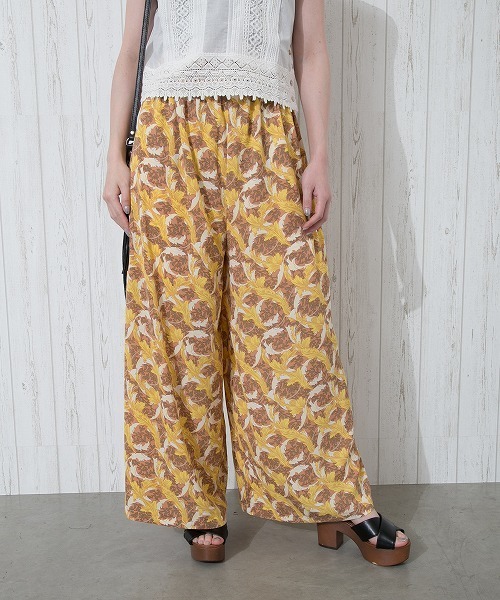 Libby&Rose(リビーアンドローズ)の「アラベスク柄ワイドパンツ(その他パンツ・レディース・ブラック/オレンジ・FREE)」の1枚目の写真