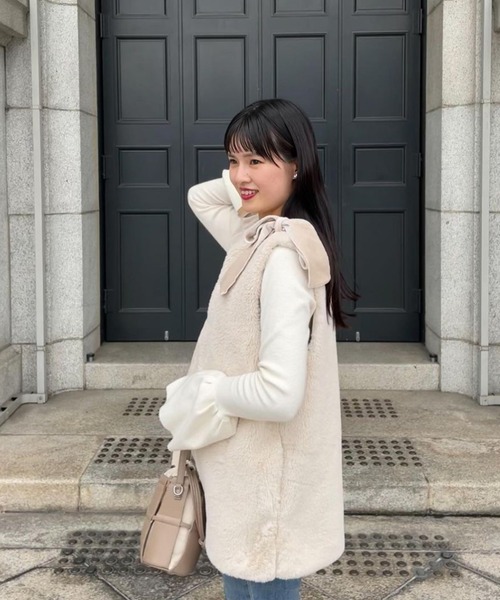 Fit more フィットモア パールボタンペプラムジレ ネイビー