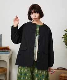 Jocomomola（ホコモモラ）の「裏地プリント  ノーカラーミドル丈コート（ノーカラーコート）」